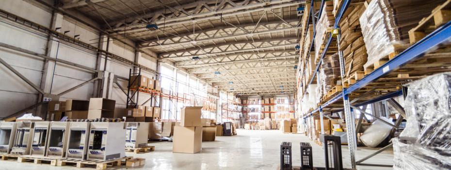 Pallets storing boxes in an industrial warehouse